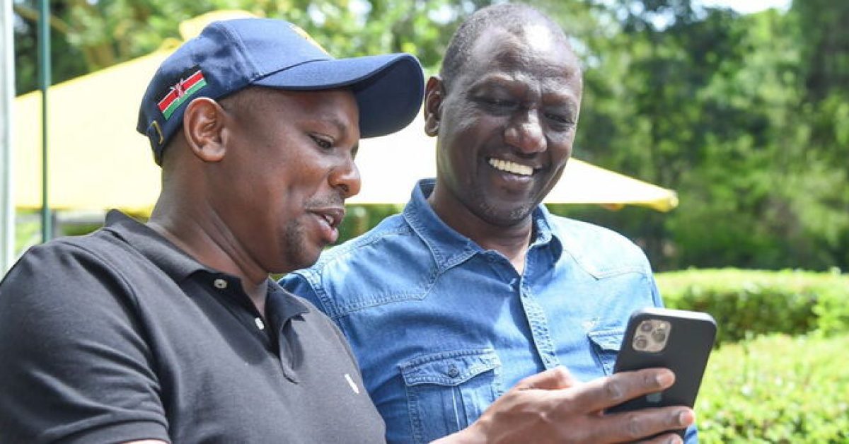 Kimani and Ruto sharing a light moment
